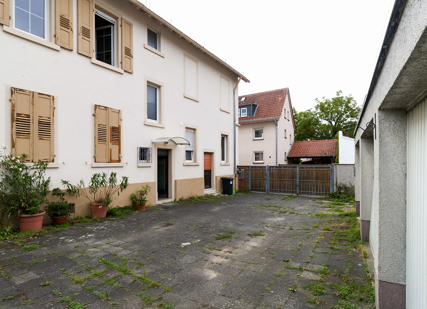 5-Familienhaus und Doppelbungalow auf einem Grundstück in Darmstadt-Arheilgen